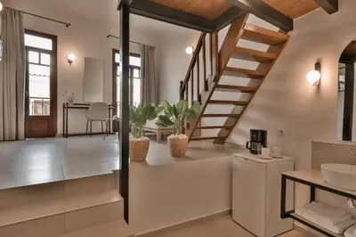 a bathroom with a staircase in a house at Casa Veneta in Chania Town