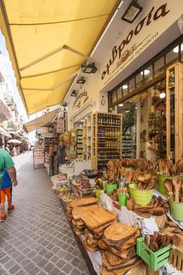 a market with a bunch of food on display at MmeBassia in Chania Town
