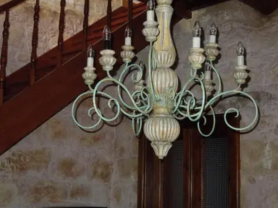 a chandelier hanging from the ceiling in a room at Villa Arhontariki in Kissamos