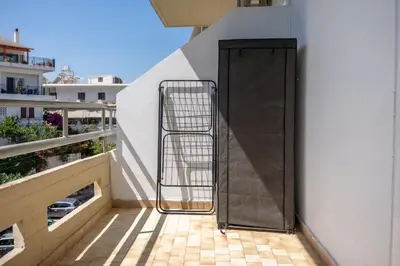 a metal door on the side of a balcony at Studio 71!Charming flat in Chania in Chania Town