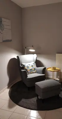 a living room with a couch and a chair at Angel-kolymvari4you in Kolymvari