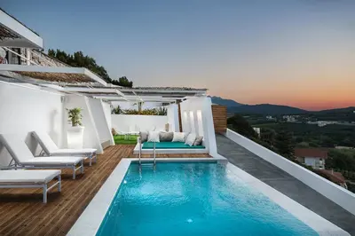 a swimming pool on the roof of a house at Villa Sapphire in Almirida