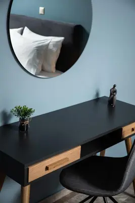 a desk with a mirror next to a bed at Dreamy Holidays Apartment in Chania Town