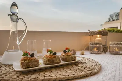 a plate of food on top of a table at Villa Georgia Apartments & Suites in Kalamaki Chanion