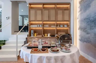 a table with some pastries on top of it at Frini Hotel in Chania Town