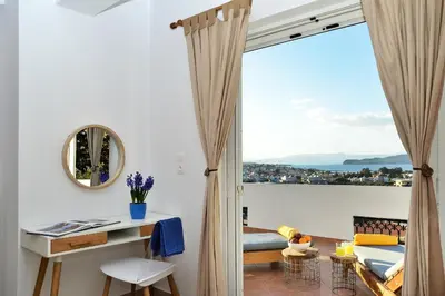 a living room with a view of the ocean at Villa Anva in Kato Daratso