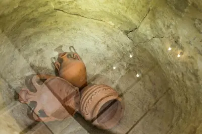 a brown pot sitting on the ground on the floor at Trigono Luxury House in Kissamos