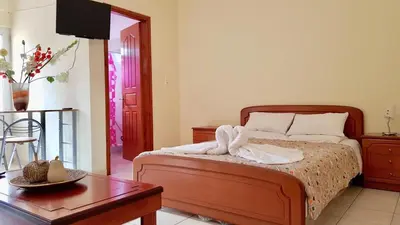 a bedroom with a bed and a table at Irene's studio in chania in Chania Town