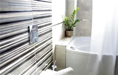 a bathroom with a toilet and a sink and a shower at Casa Ariadne in Plataniás