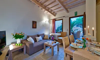 a living room with a couch and a table at Kores Boutique Houses in Chania Town