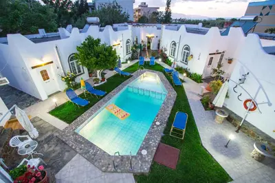 an overhead view of a swimming pool on a house at Konaki Apartments in Maleme