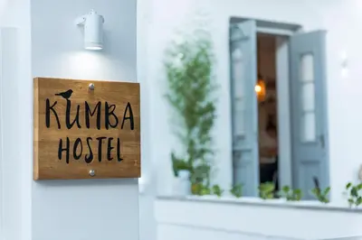 a sign that reads kuna hostel in front of a mirror at Kumba in Chania Town