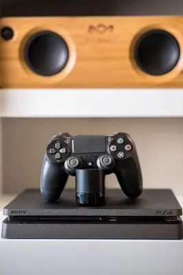 a video game controller sitting on top of a box at Oniros Residences in Souda