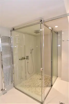 a shower with a glass enclosure in a bathroom at Villa Evangelia in Chania Town