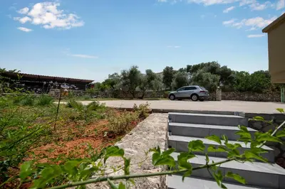 a car is parked in a parking lot at Valia's House in Kato Daratso