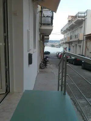 a green mat on the side of a building at Brigitte house in Chania Town