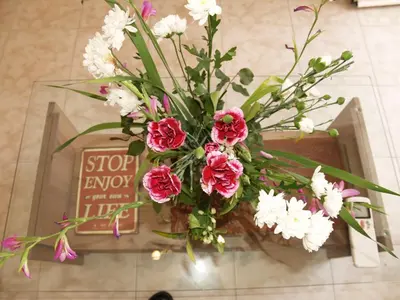 a vase filled with pink and white flowers at Brigitte house in Chania Town