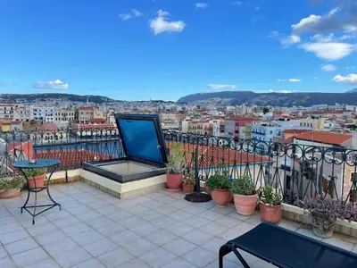 a balcony with a view of a city at Ifigenia by Captain Michalis in Chania Town