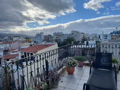a balcony with a view of a city at Ifigenia by Captain Michalis in Chania Town