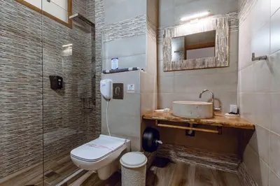 a bathroom with a sink and a toilet at Deluxe Suites in Chania Town