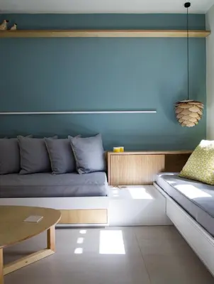 a living room with a couch and a table at Villa Pefki in Chania Town