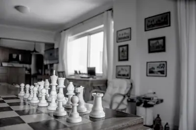 a chess set on a chessboard on top of a room at Thalassa Old Town Apartment in Chania Town
