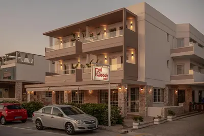 a car parked in a parking lot in front of a building at Pal Beach in Palaiochóra