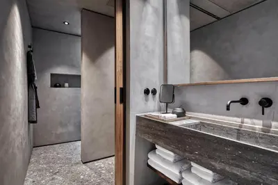 a bathroom with a sink and a mirror at Domes Zeen Chania, a Luxury Collection Resort, Crete in Kato Daratso