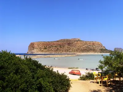 a view of a beach with boats in the water at Villa Rotunda A in Kolymvari