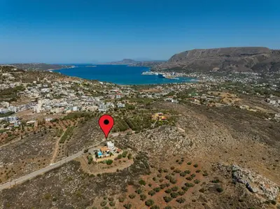 an aerial view of a red marker on a hill at Karmilos Hill Villa in Chania Town