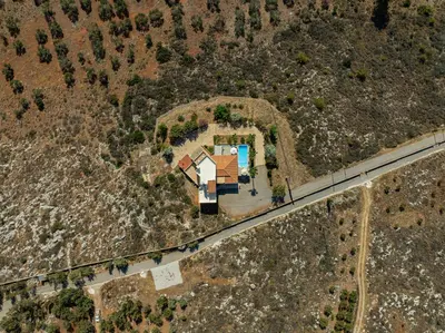 an overhead view of a house with a pool at Karmilos Hill Villa in Chania Town