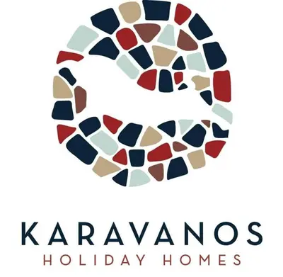 a logo for karma homes holiday homes at Elvie House in Chania Town