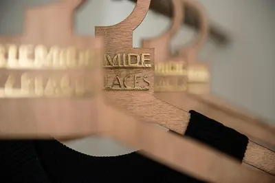 a close up of a piece of wood with the words nice arts at Artemide city places- Petite Apartments in Chania Town