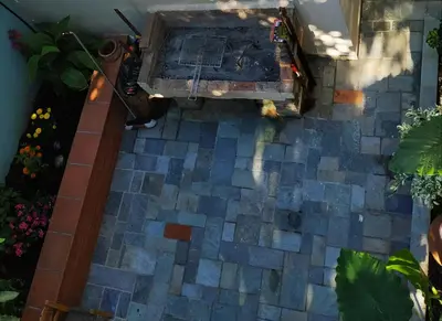 an overhead view of a patio with a hot tub at Zacharoula's Home in Chania Town
