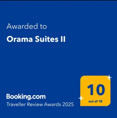 a yellow square with the words organized to orange suites at Orama Suites II in Kato Daratso
