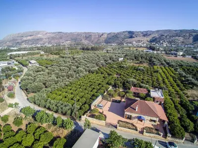 an aerial view of a house with a road and trees at Villa Anerocurù by Chania city in Chania Town