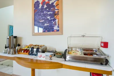 a counter with some food on top of it at ERIA RESORT for people with special abilities in Maleme