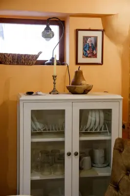 a white cabinet with a bowl on top of it at Sali Chelidonaki boutique suite in Chania Town