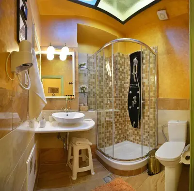 a bathroom with a shower and a sink at Casa della Favola Boutique Hotel in Chania Town