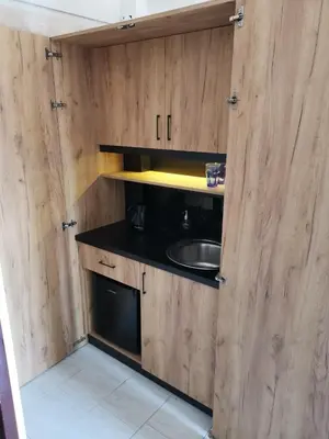 a kitchen with a sink and a counter top at Dali Rooms in Chania Town