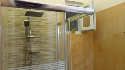 a shower with a glass door in a bathroom at Sofia's view Kissamos in Kissamos