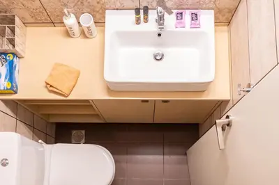 a bathroom with a sink and a toilet at Evridiki's House Central Chania in Chania Town