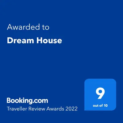 a screenshot of a phone with the text upgraded to dream house at Dream House in Perivólia