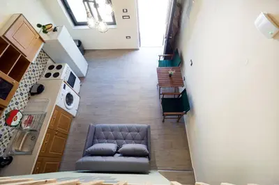 an overhead view of a living room with a couch at Kyriaki's Traditional Loft in Galatás
