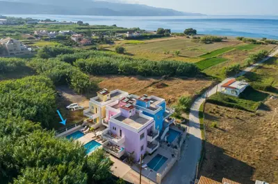 an aerial view of a house with the ocean at Geas House Thalassa in Kolymvari
