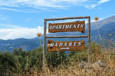 a sign that says applicants and wizards on a mountain at Madares Apartments Anopolis in Anopoli Sfakion