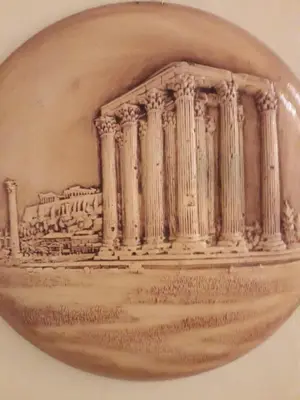 a vase with a drawing of a building at Parthenon Hotel in Souda