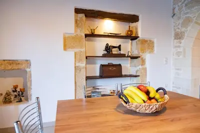 a basket of fruit sitting on top of a table at Traditional Villa in fres in Frés