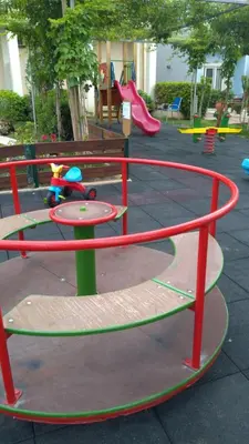 a playground with a play equipment in a park at Melina Beach in Plataniás