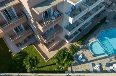 an overhead view of a building with a swimming pool at Dias Hotel Apartments in Agia Marina Nea Kydonias